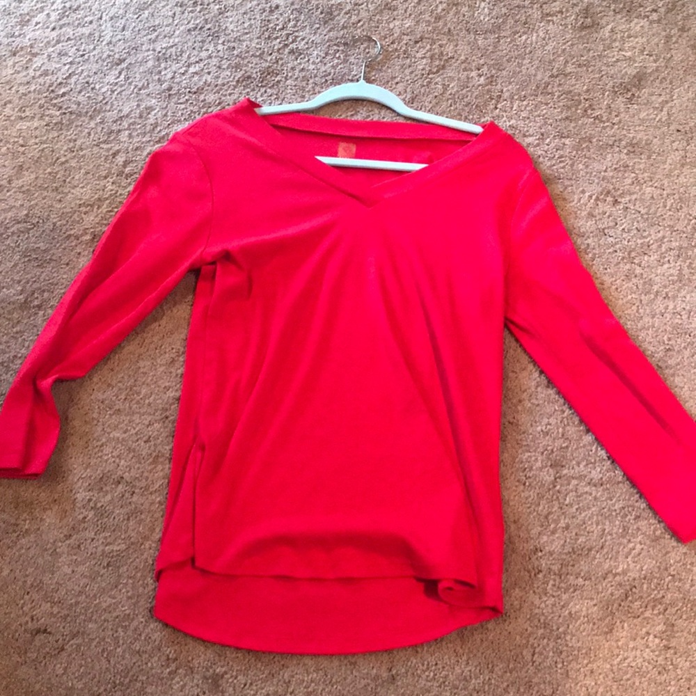 Red V-neck light sweater
